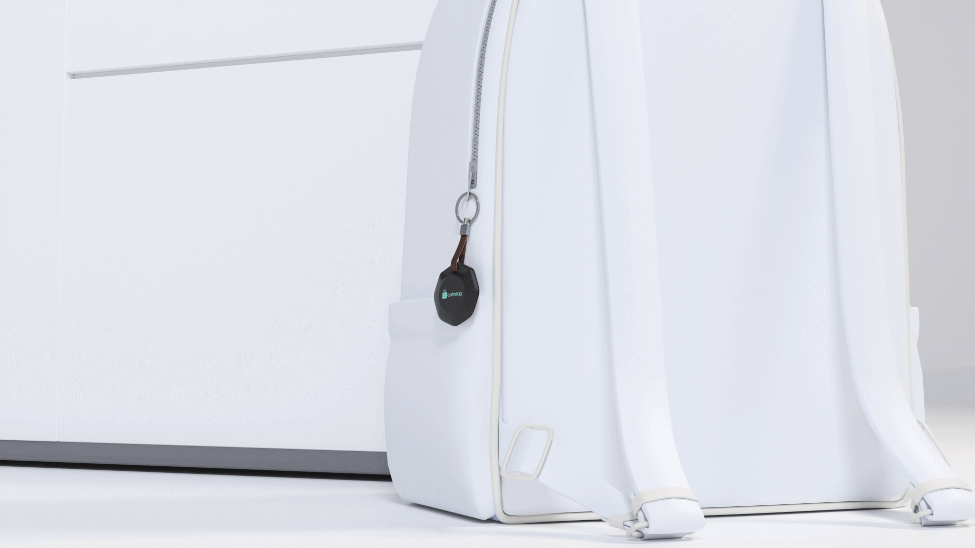 Photorealistic render of the Calmtag GPS device attached to a backpack, demonstrating discreet integration into everyday accessories