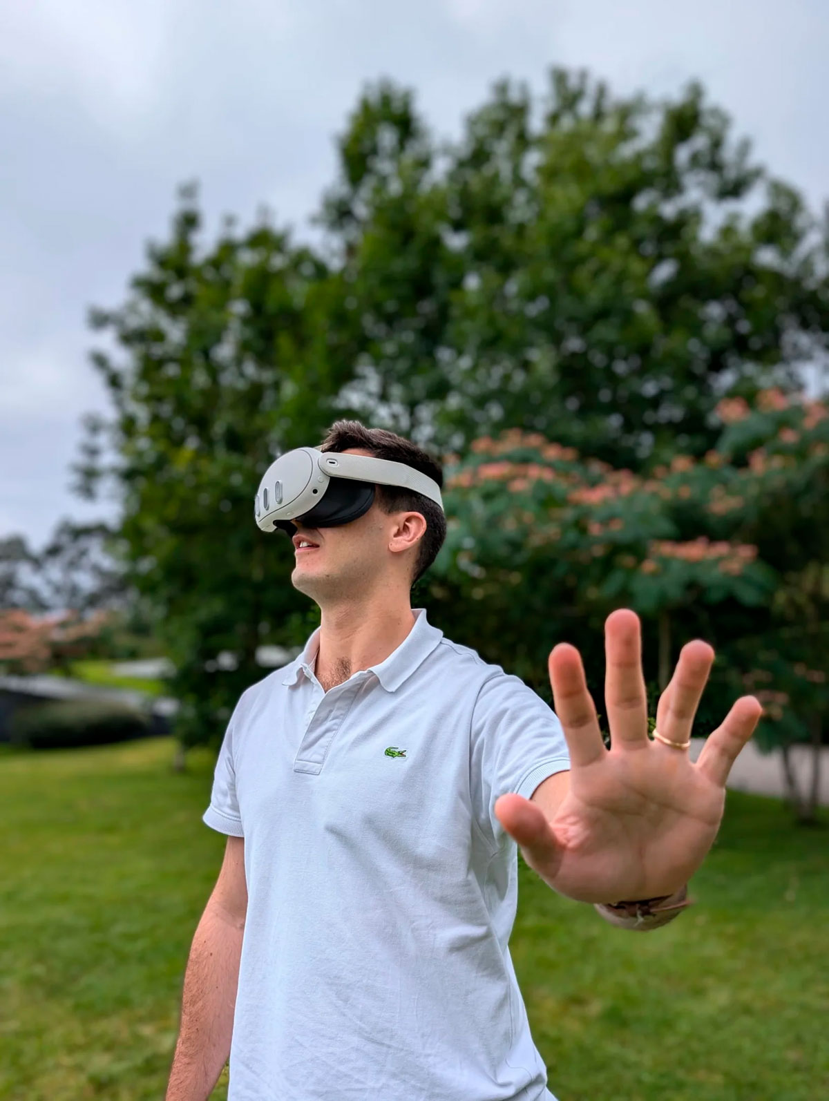 Visitor wearing Meta Quest virtual reality headset navigating between the virtual worlds of the open-air museum
